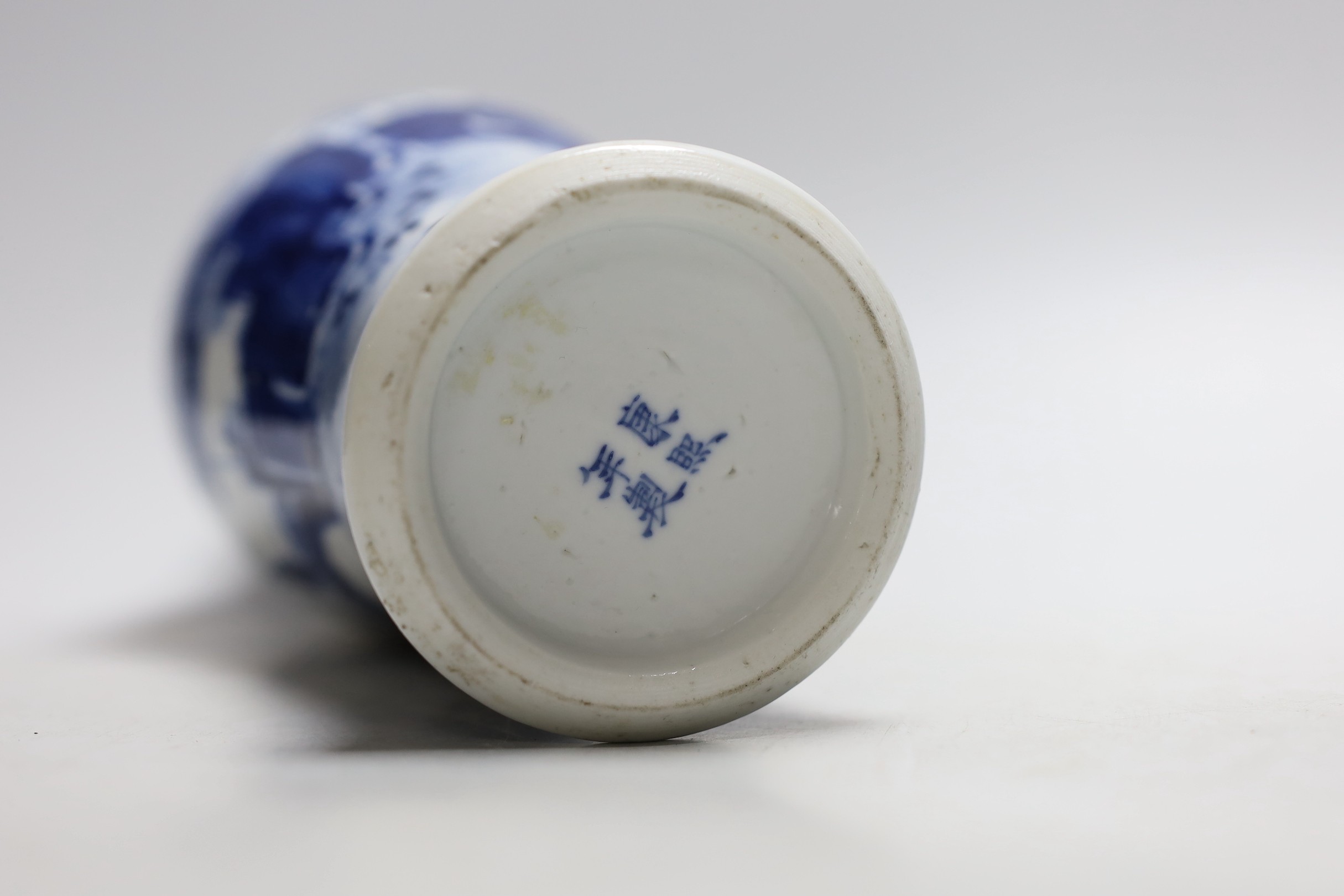 A 19th century Chinese blue and white baluster vase, 23cms high